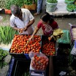 India expects food inflation to slow in coming months, government report says