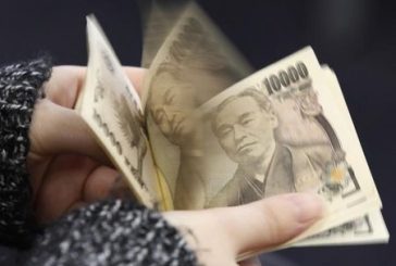 Japanese yen slides past key 155 level after BOJ holds rates steady