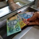 Asia FX inches up on China policy shift, Aussie dollar falls as RBA holds rates