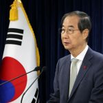 South Korea's acting president moves to reassure allies, calm markets after Yoon impeachment