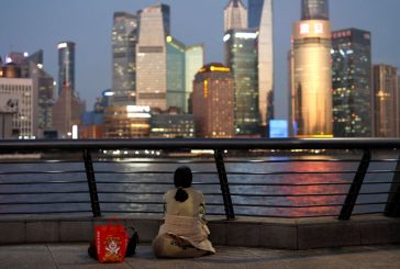 China urges more aid for people in need as economic woes persist