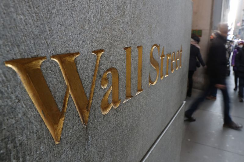 © Reuters. FILE PHOTO: A street sign, Wall Street, is seen outside New York Stock Exchange (NYSE) in New York City, New York, U.S., January 3, 2019. REUTERS/Shannon Stapleton/File Photo