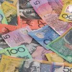 Australian dollar slides to 4-mth low as soft GDP fuels rate cut bets