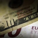 Dollar boosted by rising Treasury yields; euro slips on weak data