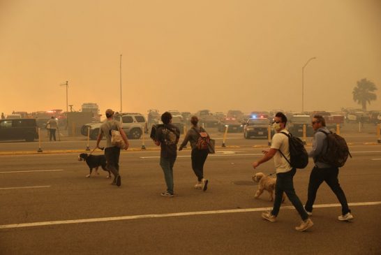 Wildfires rage in Los Angeles, forcing tens of thousands to flee