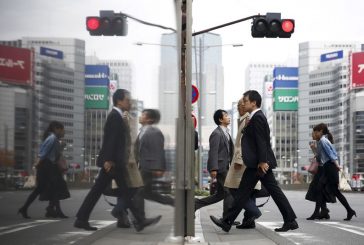 BOJ sees widening wage hikes, signals chance of near-term rate hike